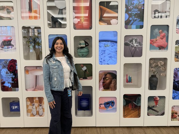 a person standing in front of a display of different items