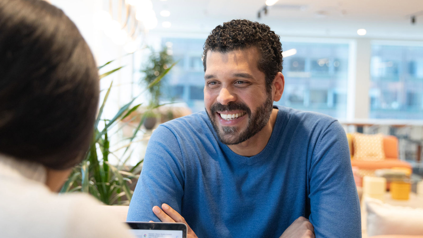 a person smiling at another person