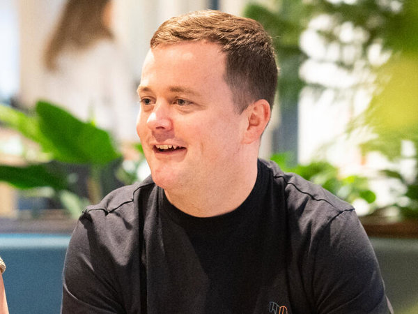 a person and person sitting on a couch