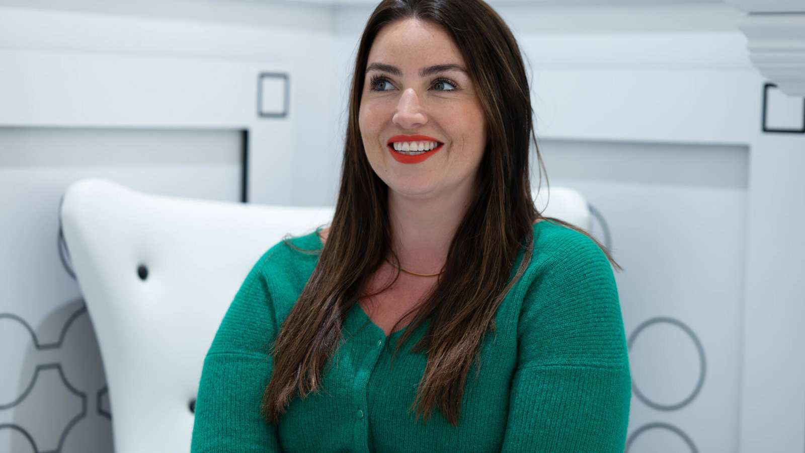 a person in a green sweater