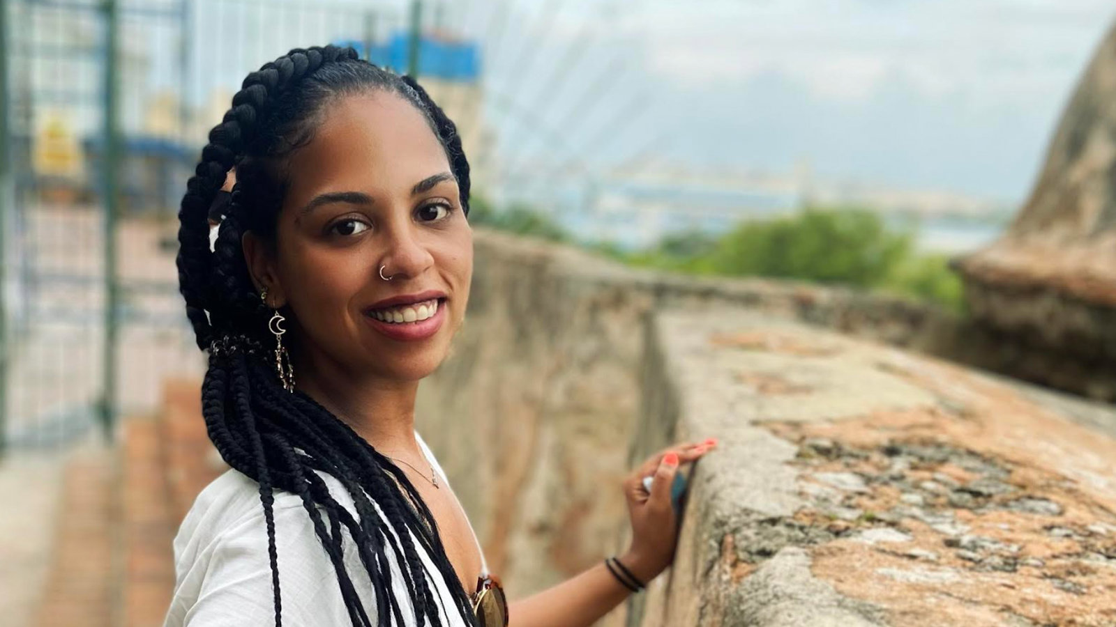 a woman smiling at the camera