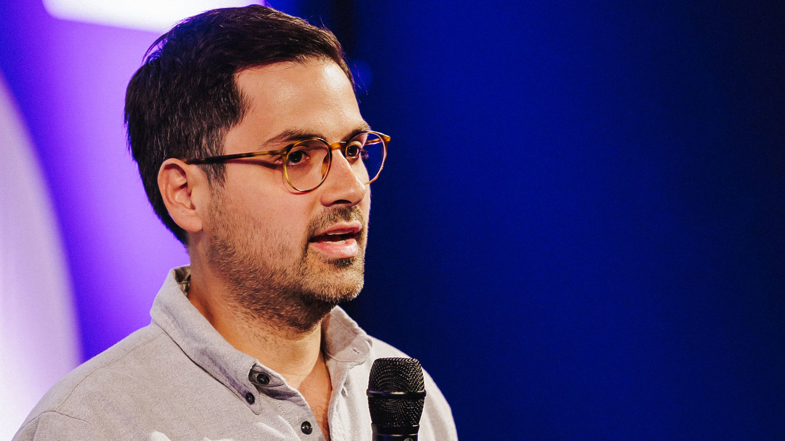 a man holding a microphone