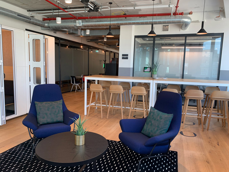 a room with chairs and a table