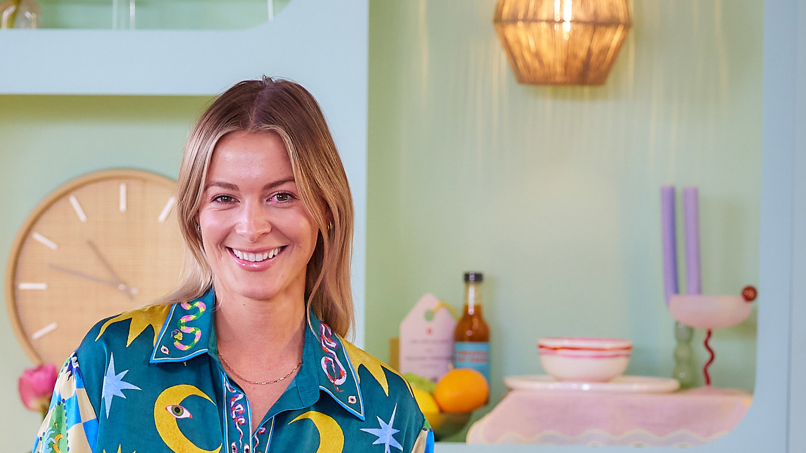 a woman in a blue jumpsuit