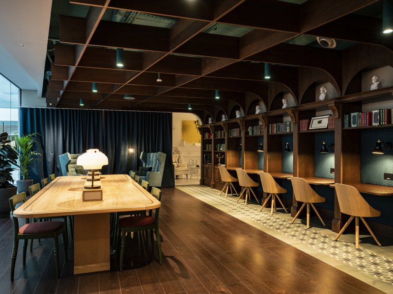 a room with a table and chairs