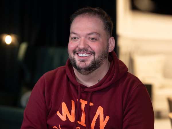 a person smiling at the camera