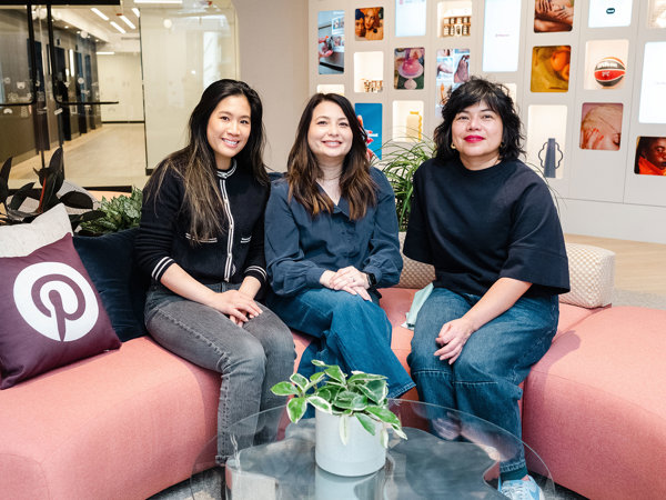 a group of women sitting on a couch