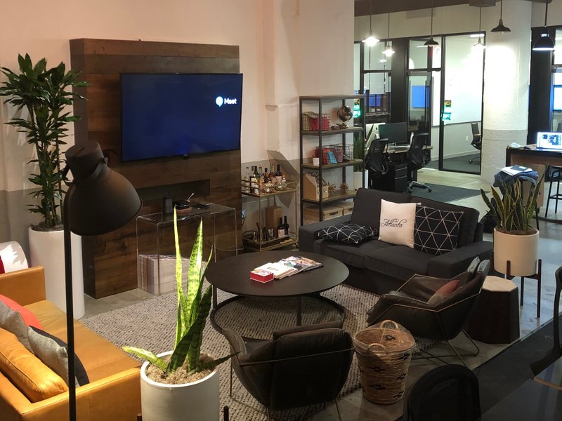 a room with a television and a couch