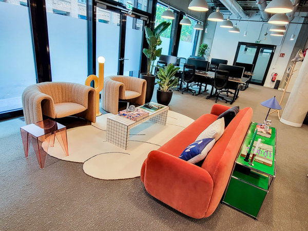 a room with chairs and tables