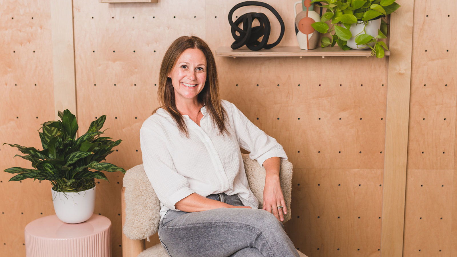 a woman sitting in a chair