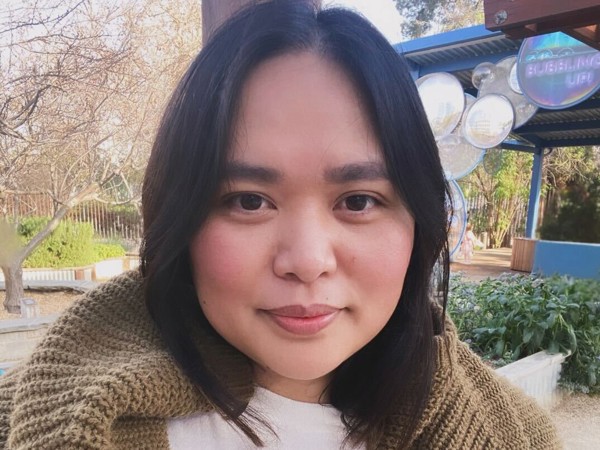 a person smiling for the camera