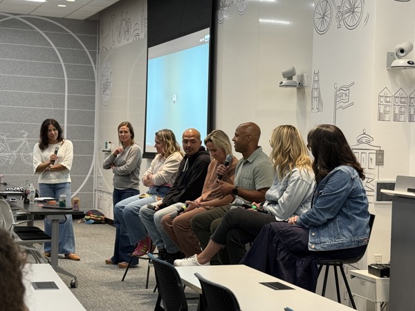 a group of people sitting in chairs