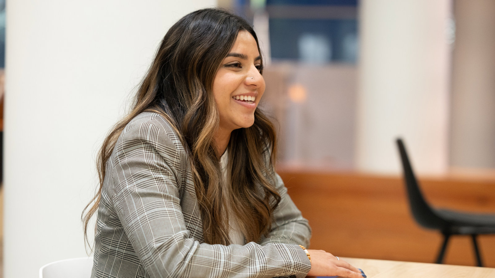 a woman sitting at a table
