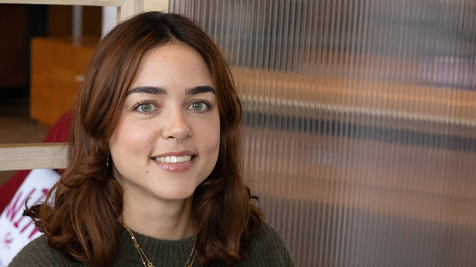 a woman smiling at camera