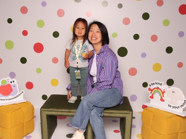 a person and a child posing for a picture