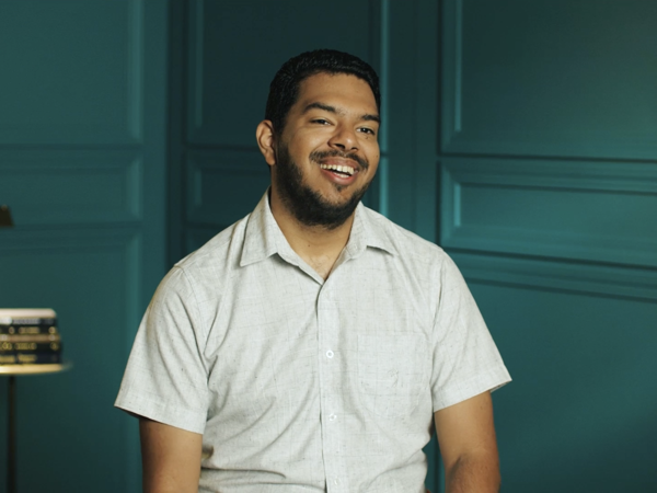 a person smiling at the camera