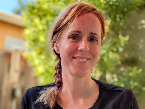 a person smiling at camera