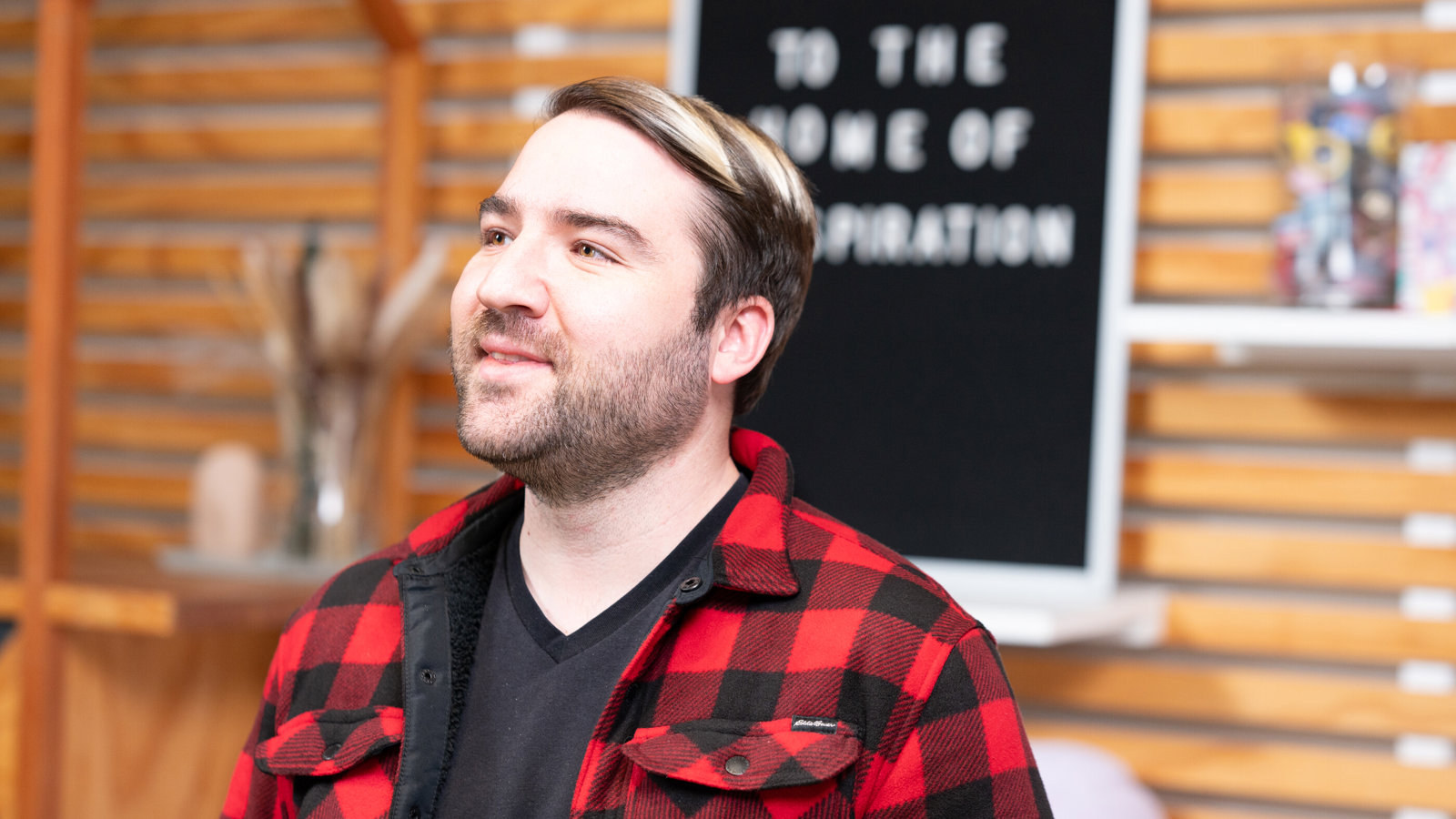 a man in a red flannel shirt