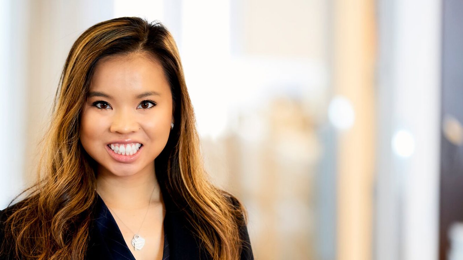a woman smiling at camera